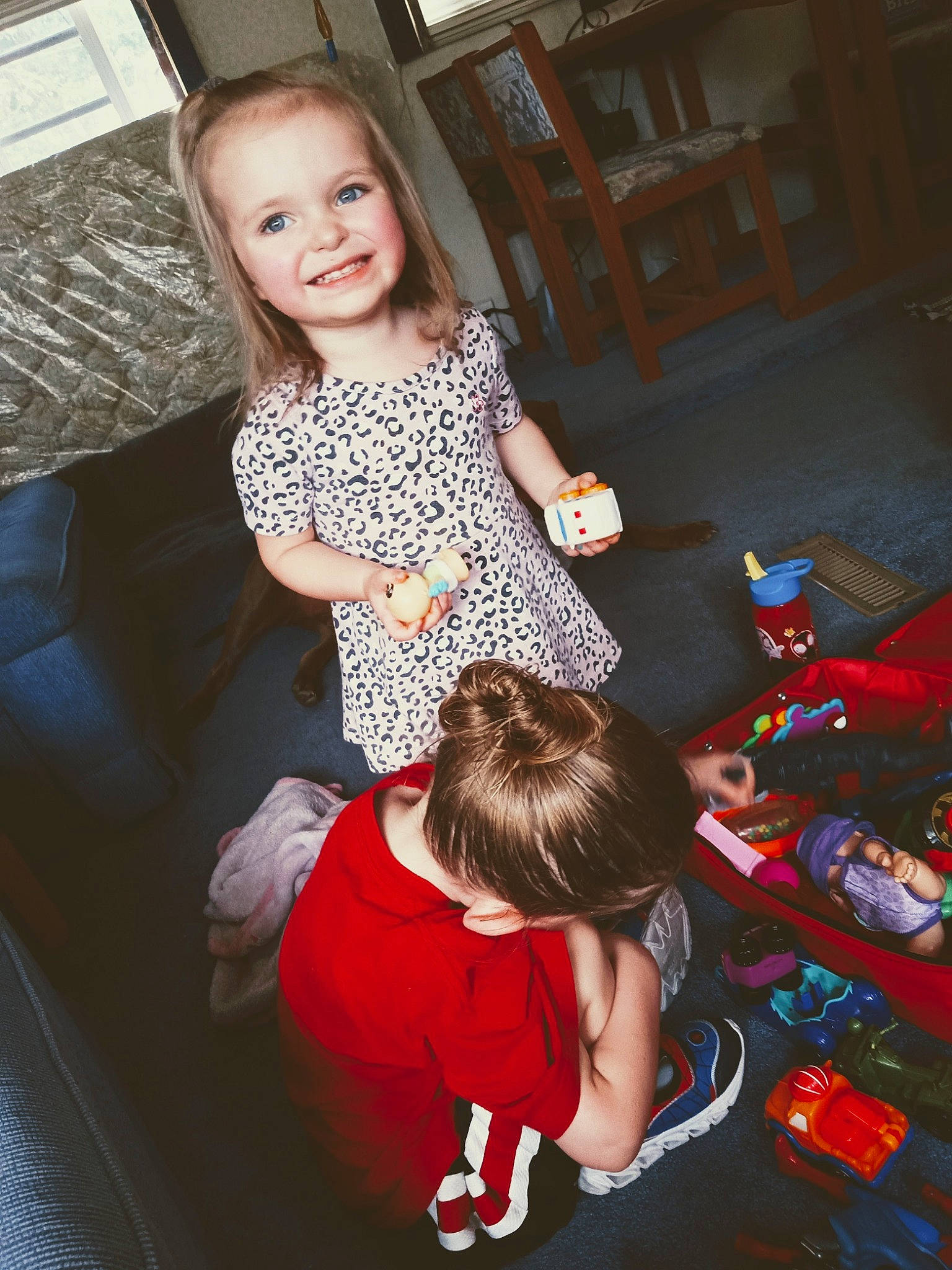 Ida-may joined the competition — help win amazing prizes! arm, baby_toddler_clothing, child, comfort, couch, event, floor, flooring, fun, hairstyle, happy, joy, lap, leisure, living_room, person, sitting, smile, t_shirt, thigh