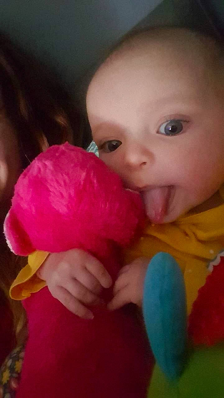 Ida-may joined the competition — help win amazing prizes! baby_products, baby_toddler_clothing, cheek, child, ear, finger, fun, gesture, hand, human_body, lip, mammal, nail, nose, person, pink, skin, stuffed_toy, thumb, toddler