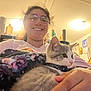 Daisy Mae joined the competition — help win amazing prizes! blanket, bottle, calendar, cat, collar, face, fur, furniture, glasses, hand, home, indoor, kitchen, light, paper_towel, person, refrigerator, smile, table, wall