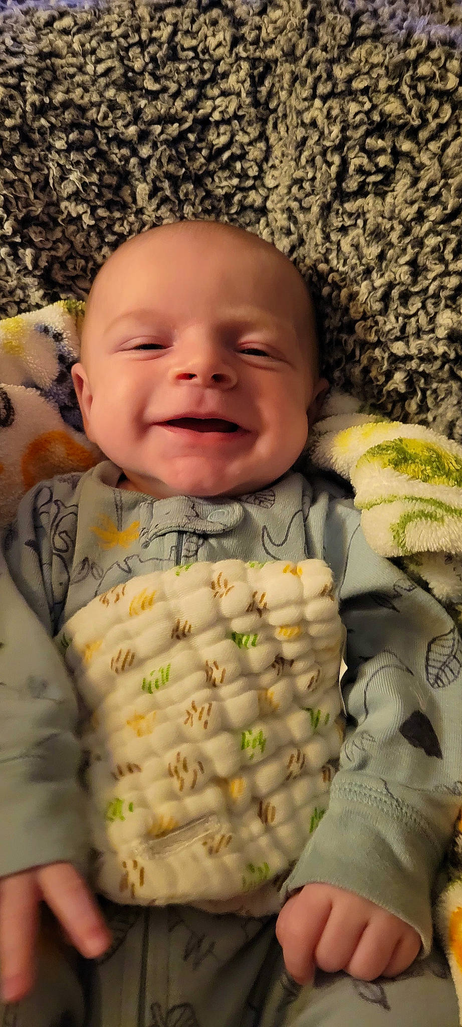Ashur joined the competition — help win amazing prizes! baby, baby_laughing, baby_toddler_clothing, cheek, child, chin, eye, face, grass, happy, head, iris, linens, mouth, nose, people_in_nature, person, skin, smile, textile