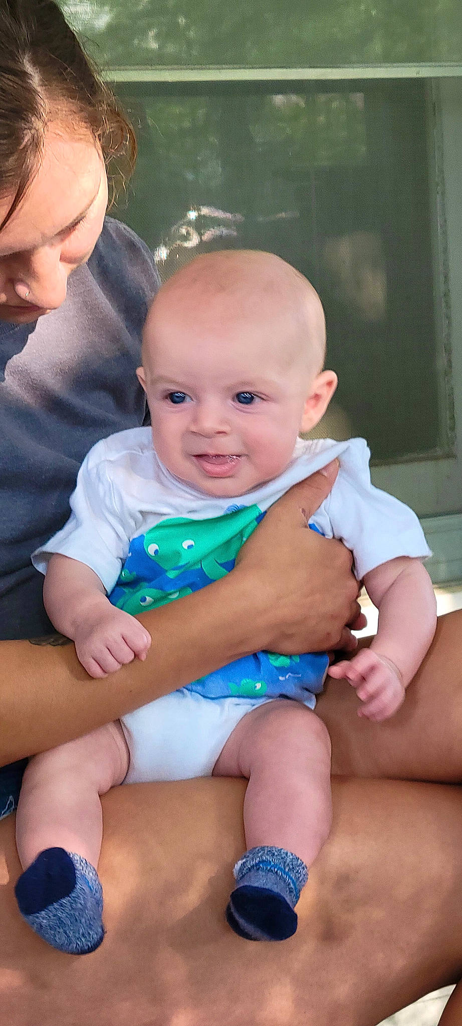 Ashur is registered to the contest to win money with this photo: baby, baby_toddler_clothing, cheek, child, eye, face, finger, happy, head, human_body, human_leg, iris, lap, leg, muscle, person, sitting, skin, thigh, toddler