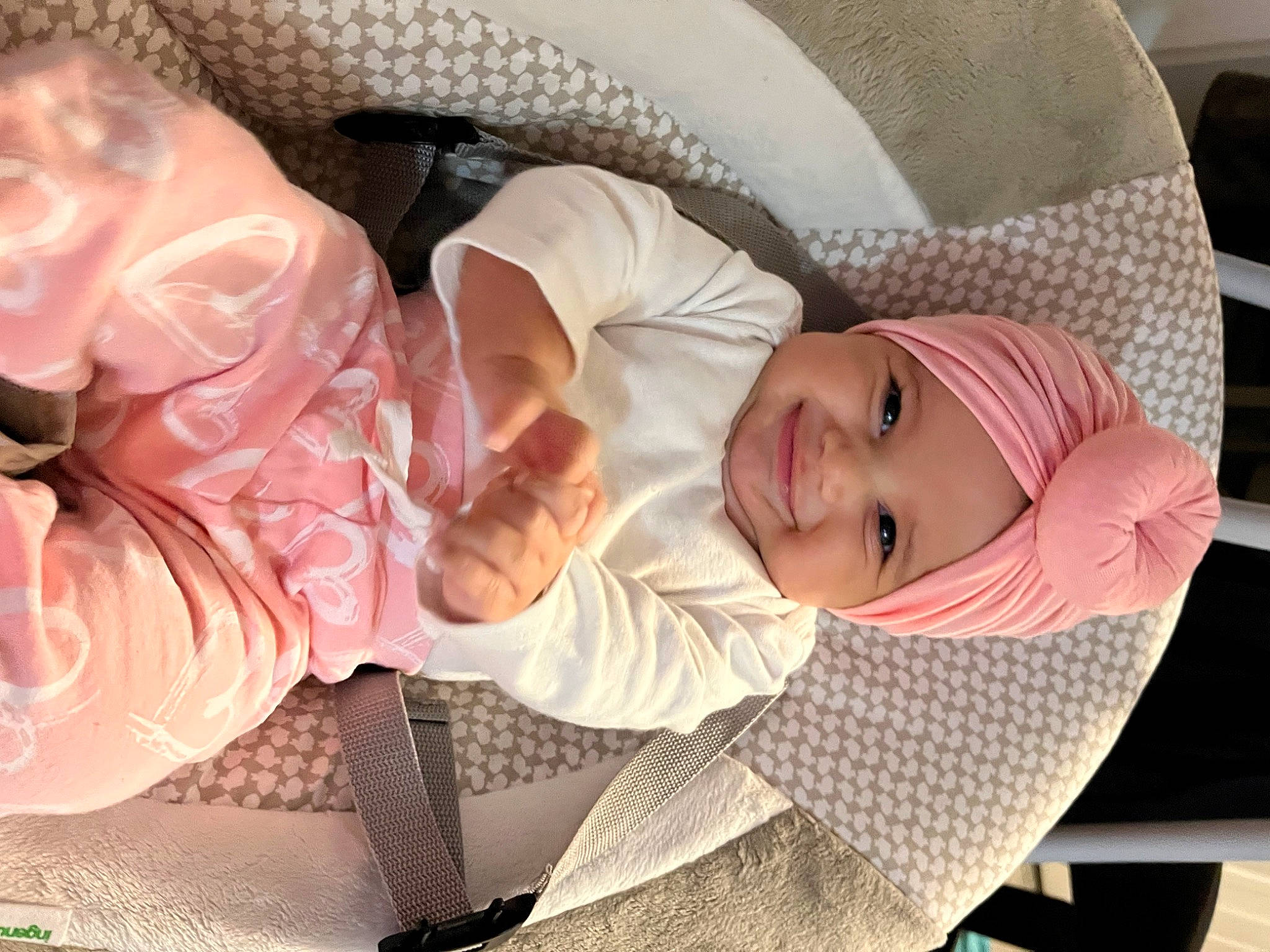 Giovanna is registered to the contest to win money with this photo: baby, baby_toddler_clothing, cheek, child, comfort, eyelash, facial_expression, finger, gesture, hand, happy, hat, headgear, headwear, joy, mouth, person, pink, product, skin