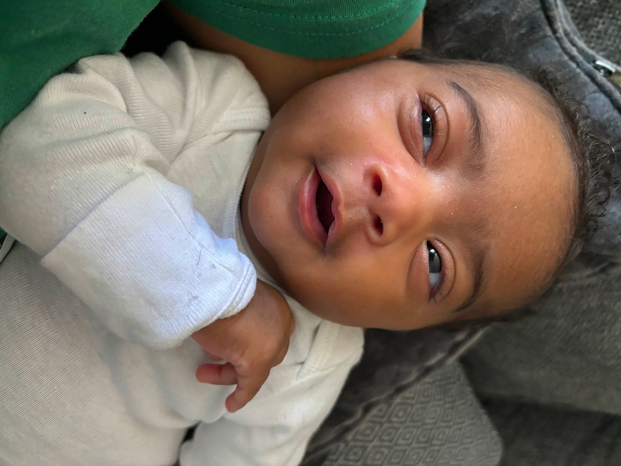 Zariyah is registered to the contest to win money with this photo: baby, baby_toddler_clothing, cap, cheek, child, comfort, eyelash, grass, happy, hat, headgear, lip, mouth, nose, person, plant, portrait_photography, skin, smile, toddler