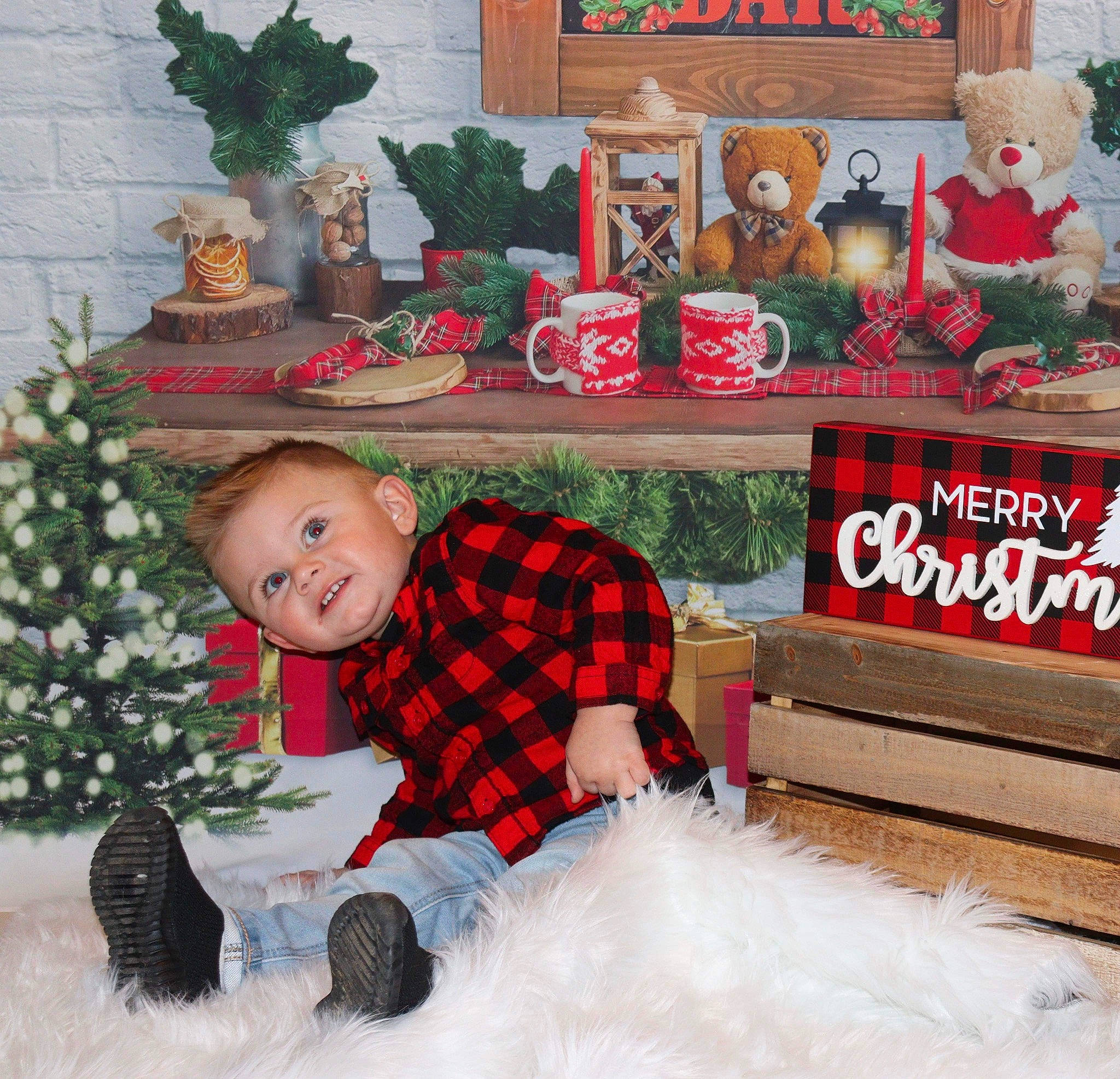 Drew joined the competition — help win amazing prizes! christmas, christmas_decoration, christmas_eve, christmas_ornament, christmas_tree, event, green, happy, holiday, holiday_ornament, lap, person, plaid, plant, product, red, santa_claus, smile, textile, toddler