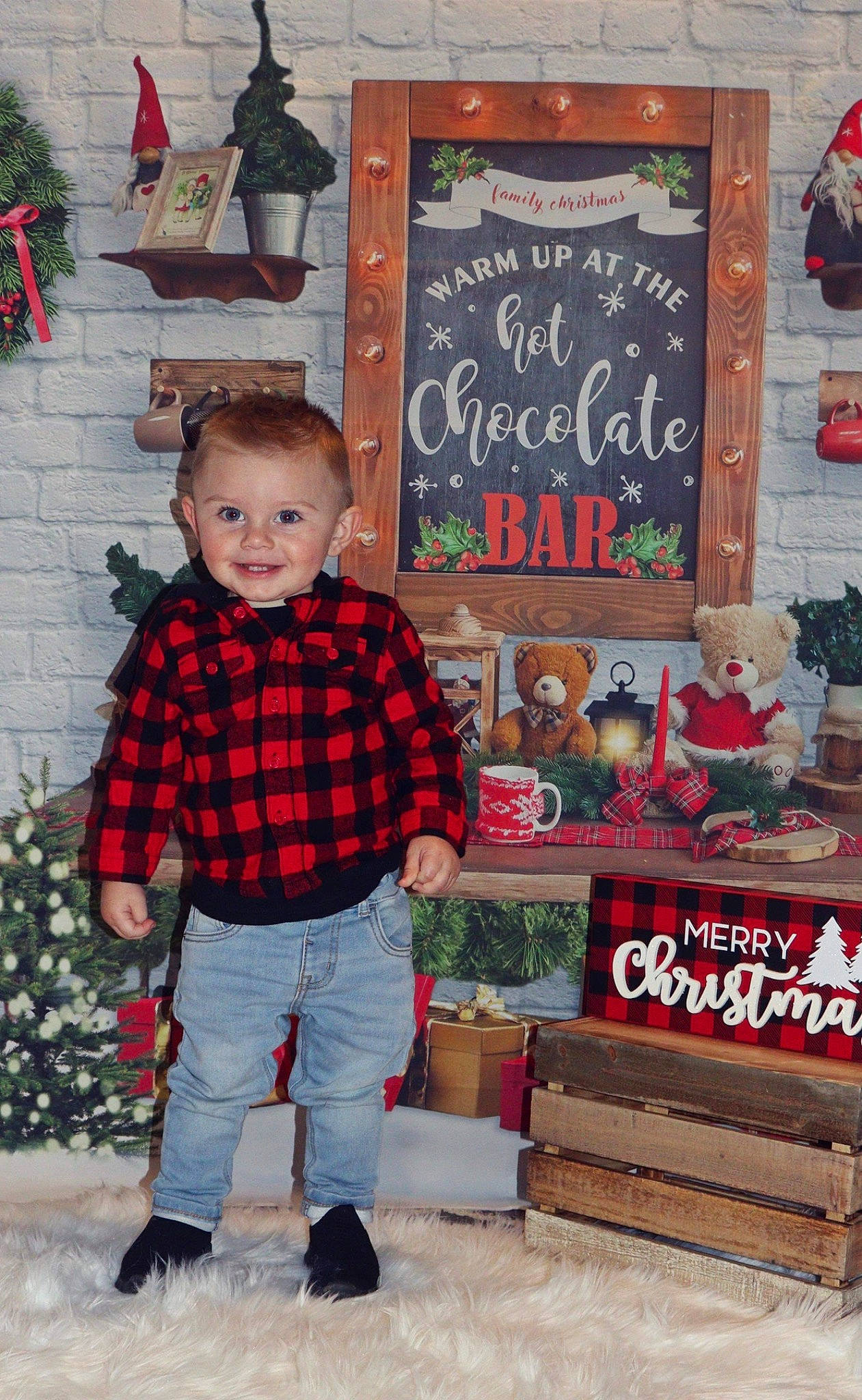 Drew joined the competition — help win amazing prizes! baby_toddler_clothing, blackboard, child, christmas, event, font, fun, happy, holiday, joy, pattern, person, plaid, red, sitting, sleeve, smile, tartan, textile, toddler