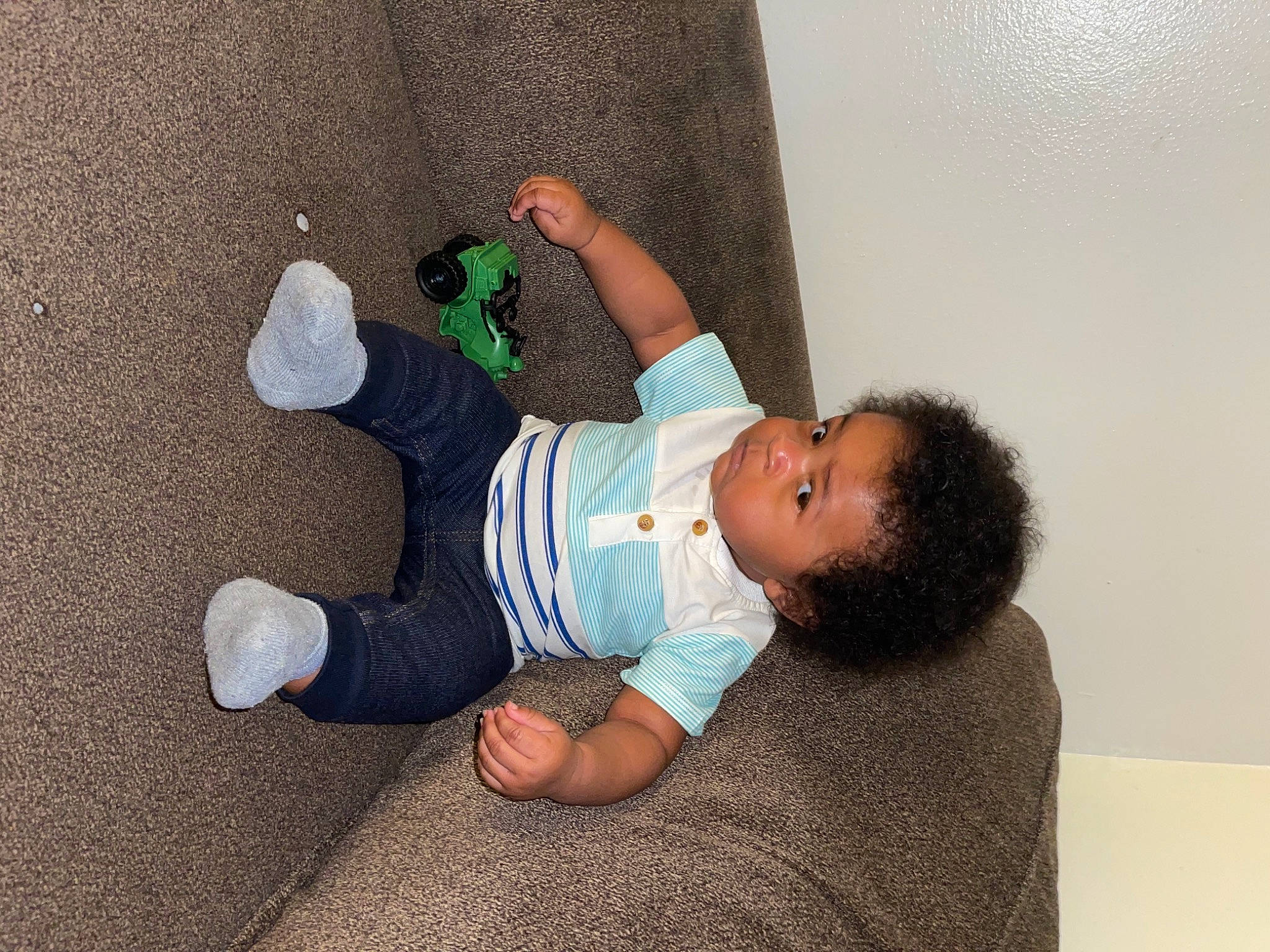 Caysen is registered to the contest to win money with this photo: baby, baby_toddler_clothing, barefoot, comfort, elbow, finger, floor, flooring, foot, human_body, human_leg, joint, knee, leg, mammal, person, sleeve, sock, t_shirt, toddler