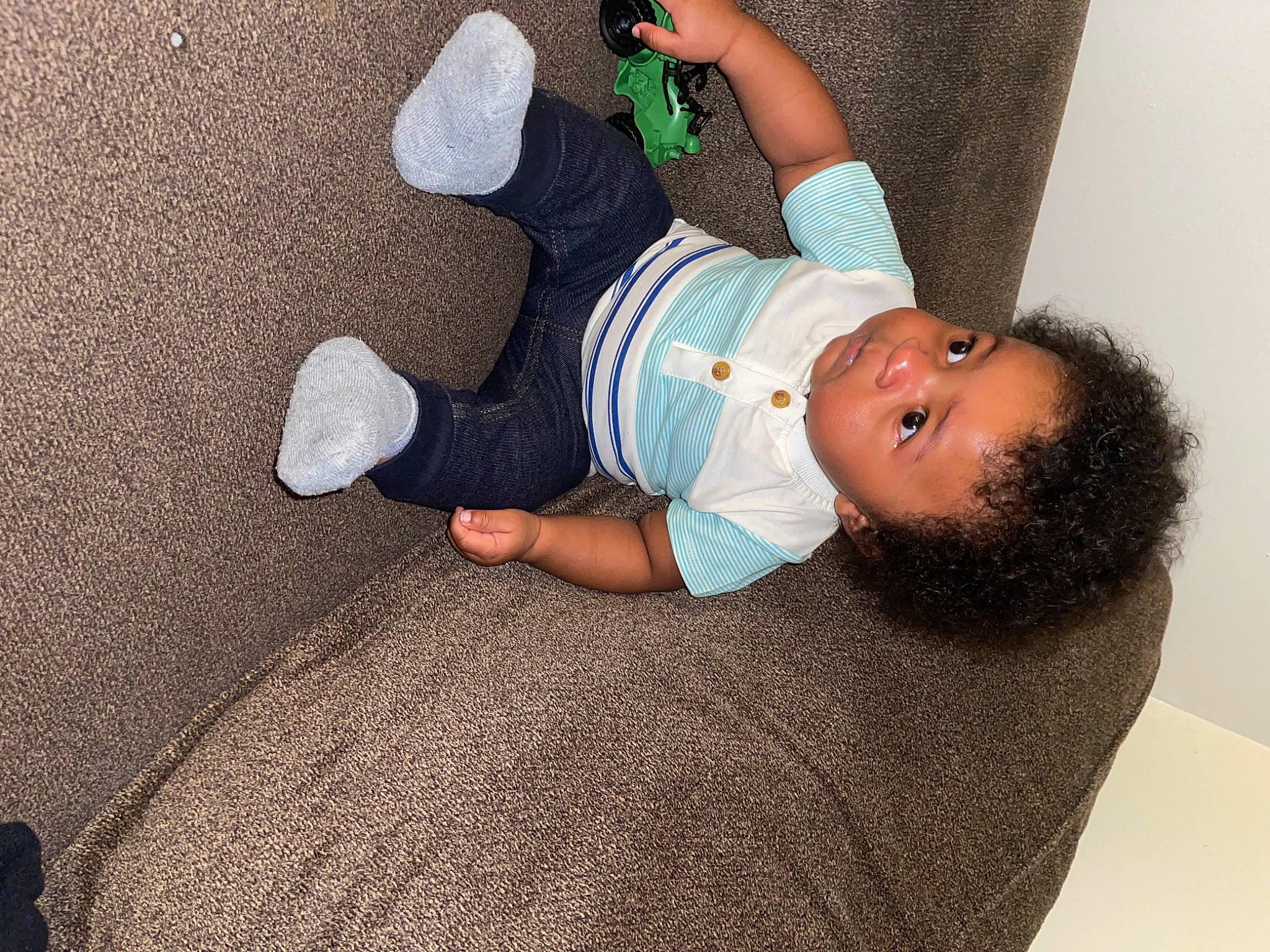 Caysen is registered to the contest to win money with this photo: baby, baby_sleeping, baby_toddler_clothing, child, comfort, elbow, flooring, foot, hat, human_leg, joint, knee, linens, person, room, sleeve, sock, textile, thigh, toddler