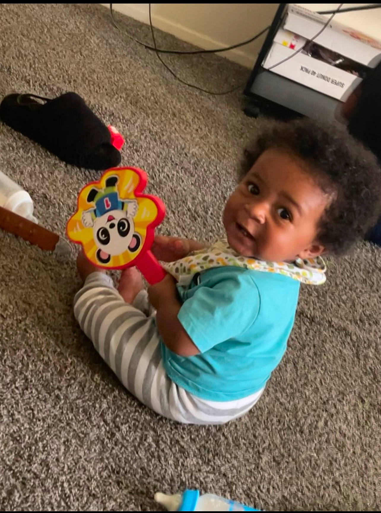 Caysen joined the competition — help win amazing prizes! asphalt, automotive_exterior, baby, baby_products, baby_toddler_clothing, baby_toys, child, facial_expression, flooring, fun, happy, leisure, person, play, sitting, smile, stuffed_toy, t_shirt, toddler, toy