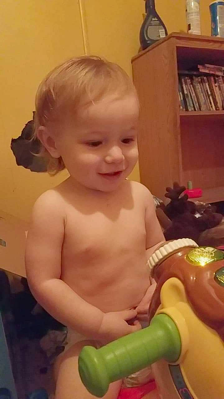 Brentley is registered to the contest to win money with this photo: baby, baby_bathing, baby_toddler_clothing, baby_toys, blond, bookcase, cheek, chest, child, chin, ear, iris, joint, organ, person, shelf, shelving, shoulder, skin, toddler