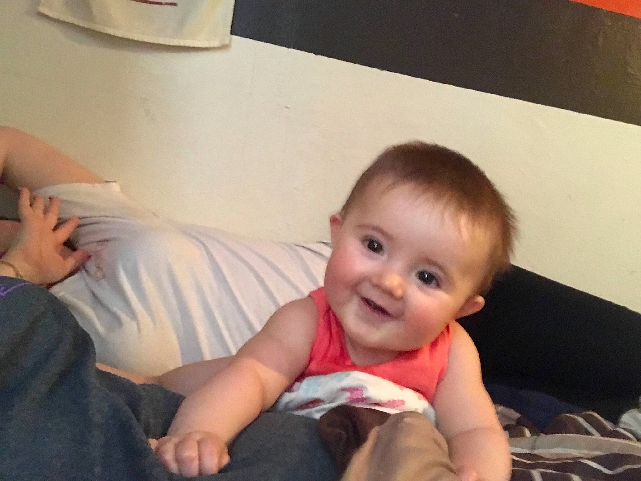 Addalyn is registered to the contest to win money with this photo: arm, baby, cheek, child, ear, electronic_device, eye, face, finger, fun, hand, head, leg, mouth, person, product, sitting, skin, thumb, toddler