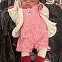 baby, infant, blanket, pink_clothing, socks, cute, stuffed_toy, pacifier, soft_toys, sleepy, indoor, child, face, person, resting, comfort, warm, baby_clothes, toddler, portrait