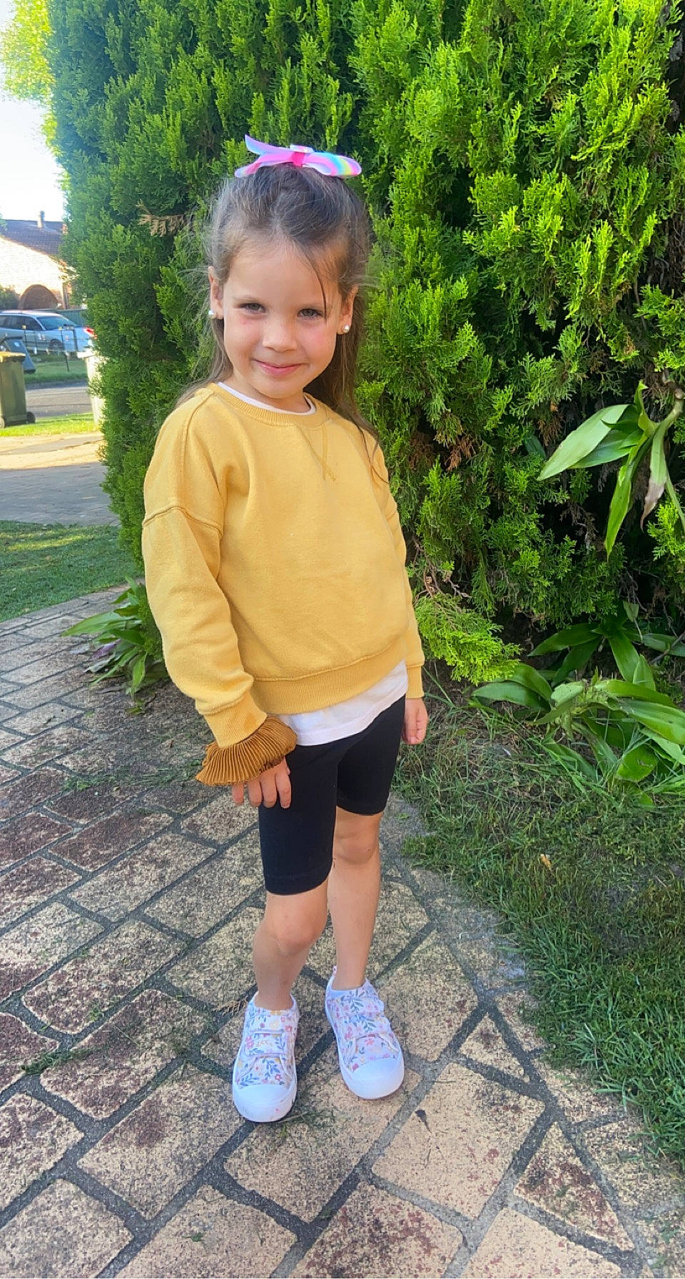 Bailee is registered to the contest to win money with this photo: child, electric_blue, fun, grass, happy, joy, knee, leg, person, pink, plant, shorts, sleeve, smile, sneakers, sportswear, t_shirt, terrestrial_plant, thigh, toddler