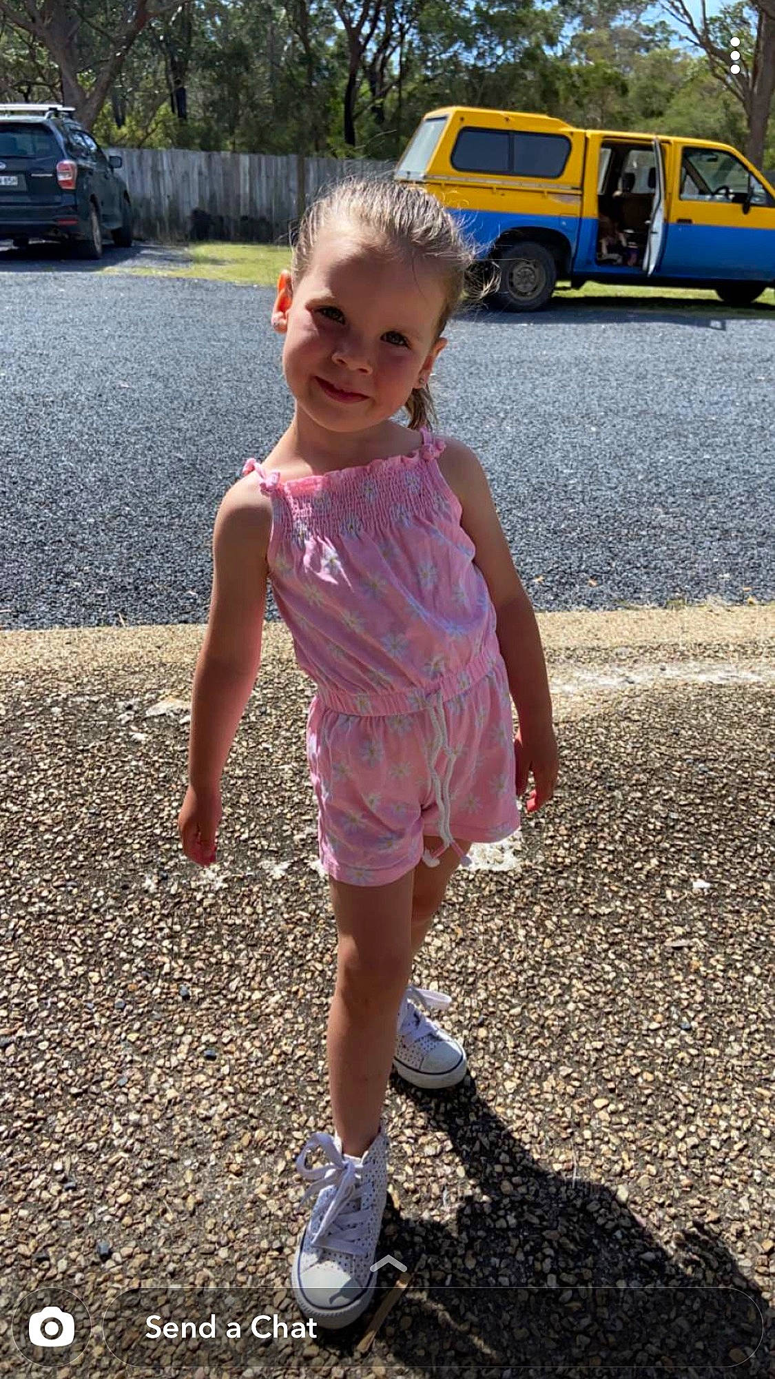 Bailee joined the competition — help win amazing prizes! asphalt, car, child, fun, grass, hairstyle, human_leg, joy, motor_vehicle, person, public_space, recreation, road_surface, sidewalk, smile, snapshot, sneakers, thigh, tire, toddler