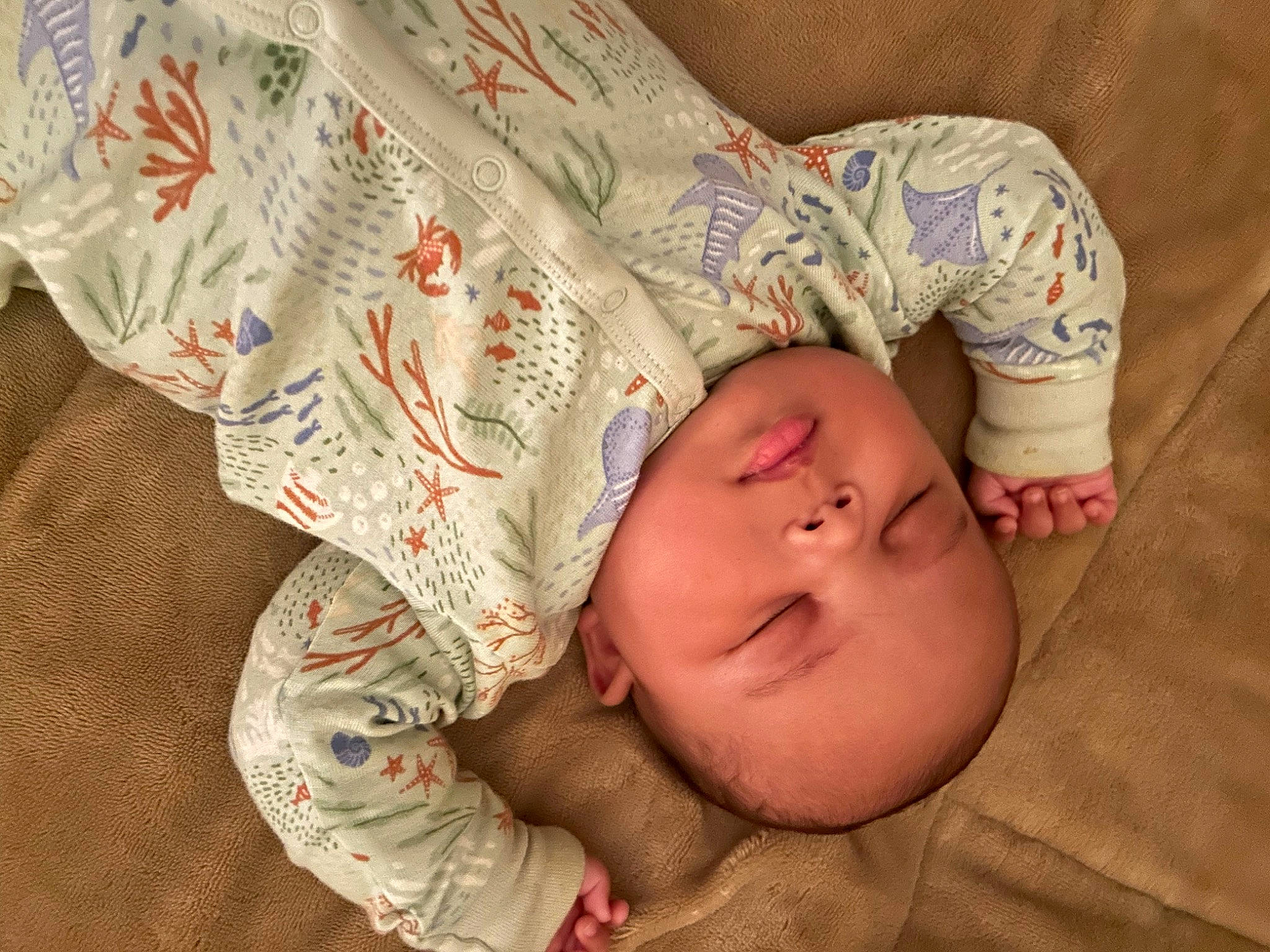 Kamari is registered to the contest to win money with this photo: baby, baby_sleeping, baby_toddler_clothing, bedding, bedtime, cheek, child, comfort, flooring, linens, nap, nose, pattern, person, room, skin, sleep, sleeve, textile, toddler
