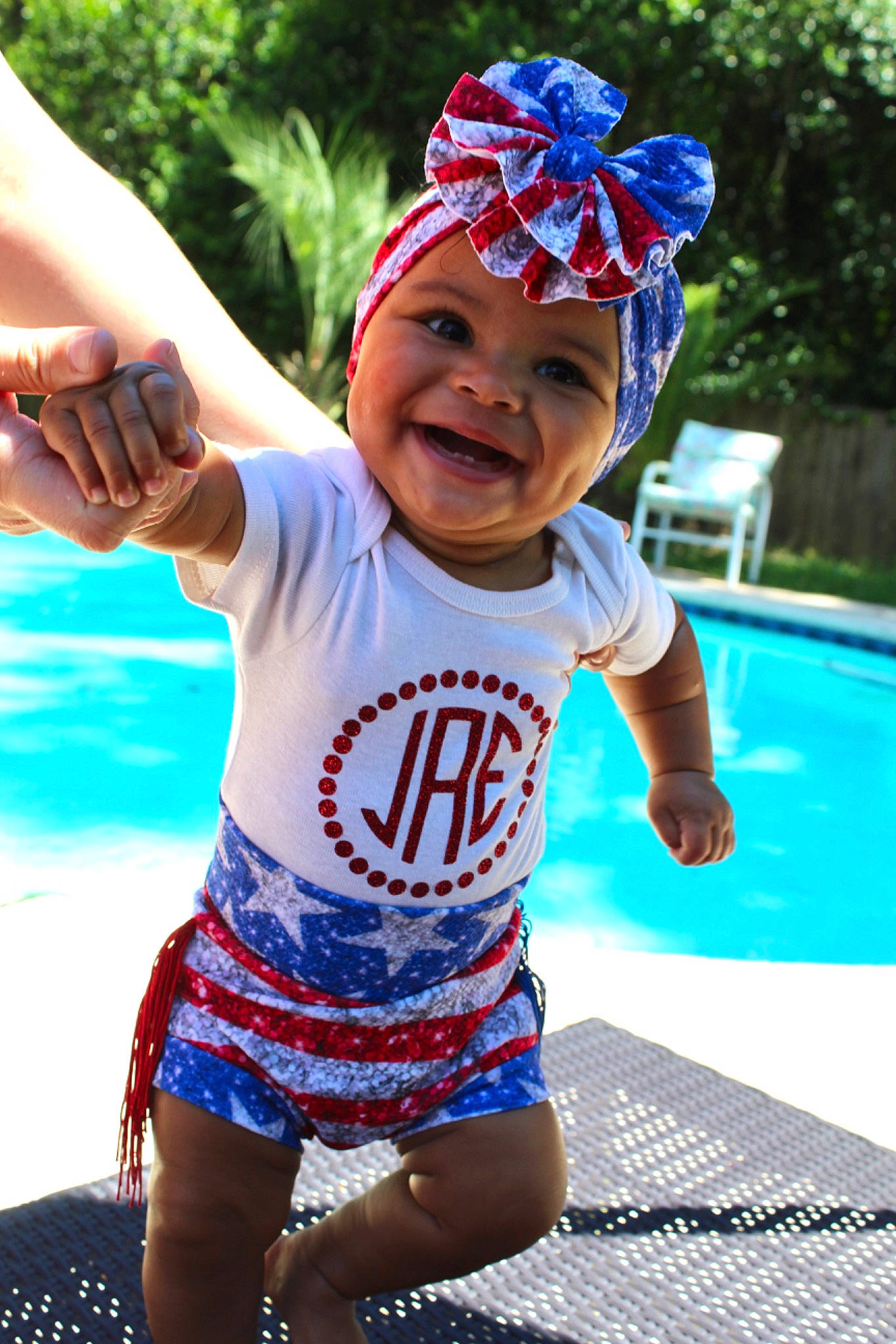 Jordynn is registered to the contest to win money with this photo: baby_toddler_clothing, baseball_cap, blue, cap, child, cool, electric_blue, fun, grass, green, happy, headgear, headwear, joy, leisure, person, plant, recreation, sleeve, smile
