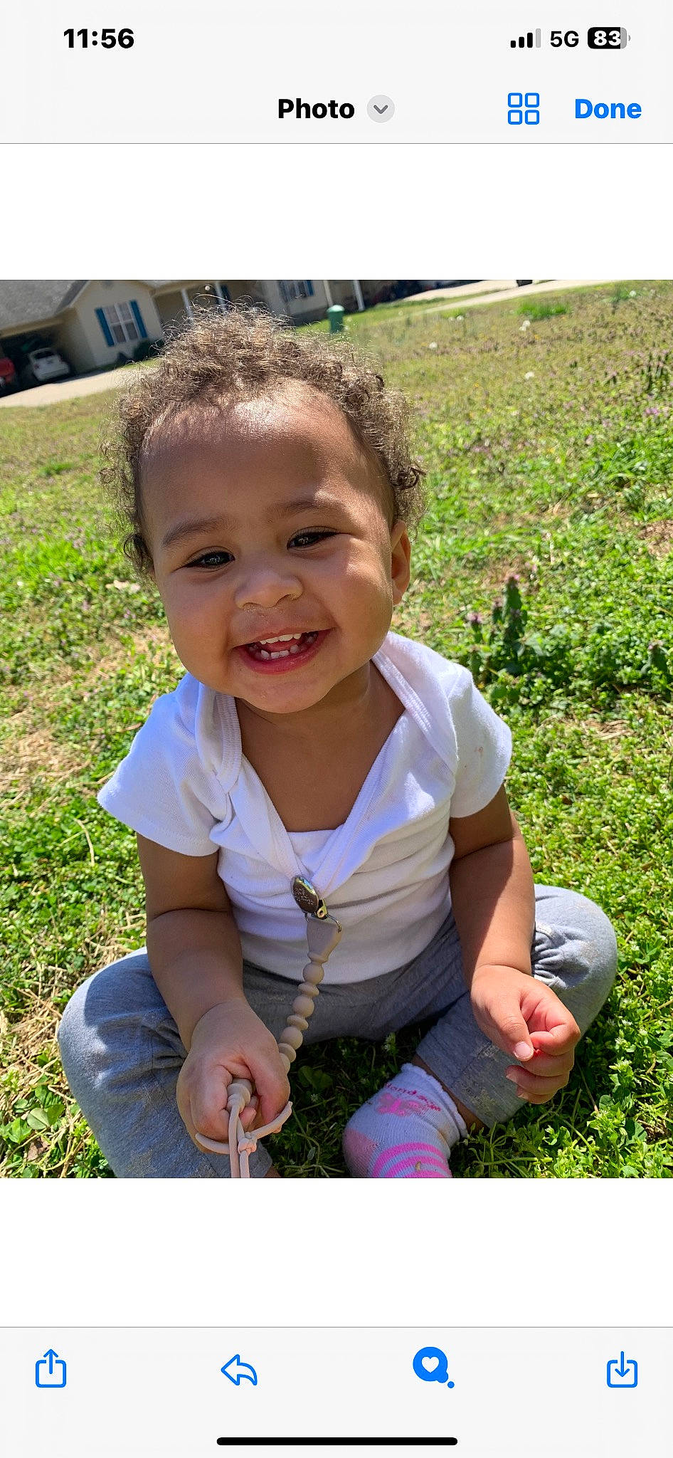 Kailani is registered to the contest to win money with this photo: baby, baby_toddler_clothing, child, clothing, finger, fun, grass, hand, happy, joy, lawn, mammal, people, people_in_nature, person, photograph, plant, sitting, smile, summer