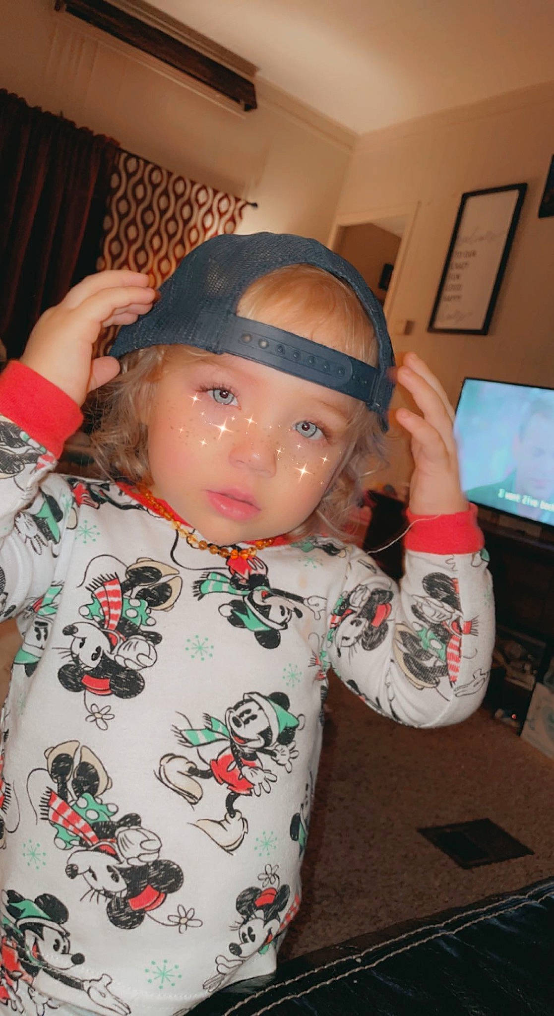 Anakin is registered to the contest to win money with this photo: baby_toddler_clothing, baseball_cap, cap, cheek, child, chin, cool, curtain, forehead, fun, gesture, happy, headgear, headwear, mouth, nose, person, personal_protective_equipment, skin, sleeve