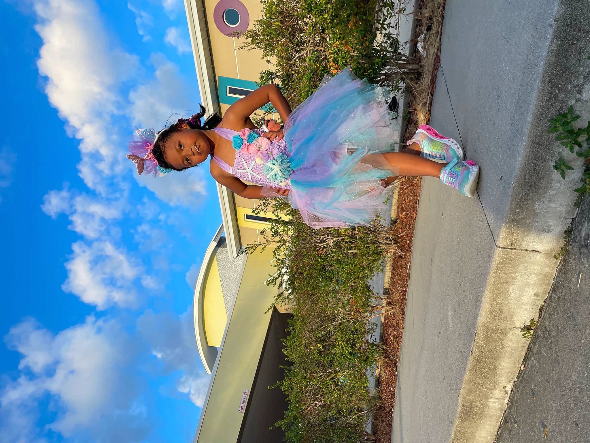 Eva is registered to the contest to win money with this photo: asphalt, azure, blue, cloud, electric_blue, fun, happy, leisure, people_in_nature, person, plant, pole, recreation, road, road_surface, shadow, sidewalk, sky, summer, travel