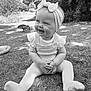 baby, child, smiling, headband, bow, grass, outdoor, nature, duck, knitted_clothing, tights, happy, sitting, sunlight, daylight, park, person, cute, portrait, young_child