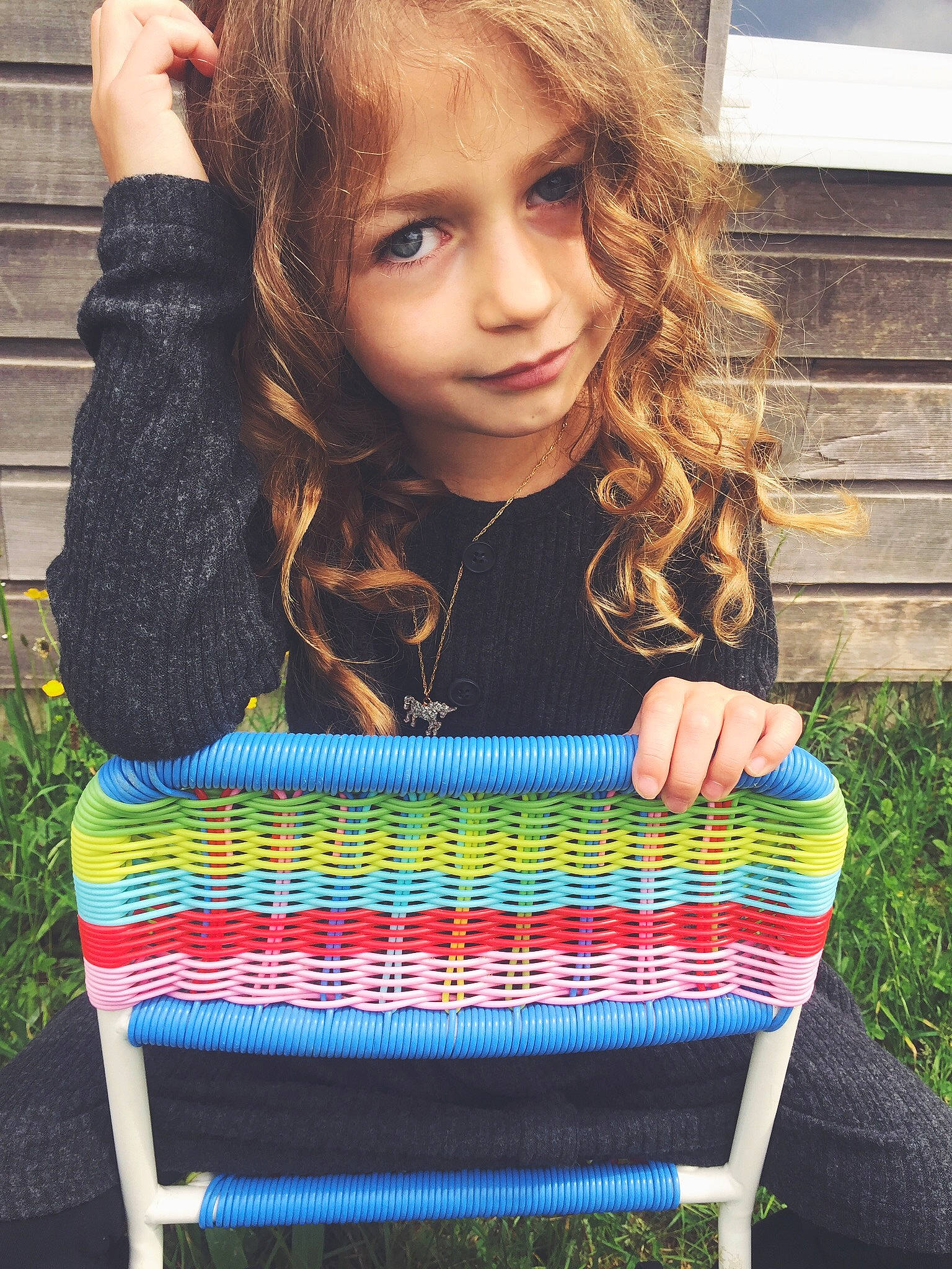 Amalia participe au concours pour gagner de l'argent avec cette photo : beauty, brown_hair, chair, child, child_model, crochet, furniture, hair, hair_coloring, hairstyle, joy, knitting, long_hair, pattern, person, plant, shoulder, sitting, smile, textile