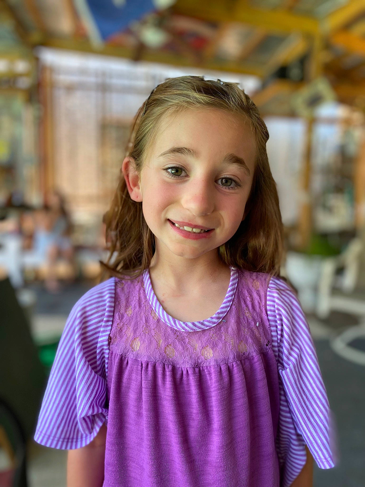 Zoey is registered to the contest to win money with this photo: blond, brown_hair, child, electric_blue, event, fashion_accessory, fashion_design, fun, happy, iris, joy, leisure, long_hair, magenta, neck, pattern, person, portrait_photography, purple, recreation