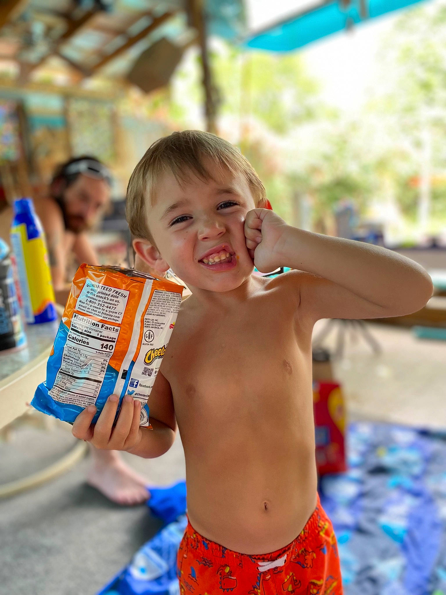 Jonathan joined the competition — help win amazing prizes! abdomen, barechested, blue, blurred, board_short, chest, child, event, face, fun, happy, joy, leisure, person, photograph, play, recreation, shorts, smile, swimwear