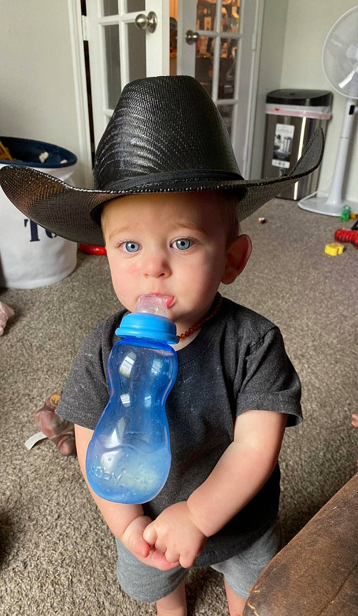 Jaxon joined the competition — help win amazing prizes! baby, baby_products, baby_toddler_clothing, bottle, cap, child, drink, drinking, drinkware, electric_blue, flooring, fun, hat, headwear, mechanical_fan, person, plastic, plastic_bottle, sun_hat, toddler