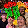 Anitamarie joined the competition — help win amazing prizes! baby, child, adult, family, glasses, headband, beard, smile, christmas, holiday, lights, gift, hat, outdoor, tree, festive, portrait, celebration, night, colorful