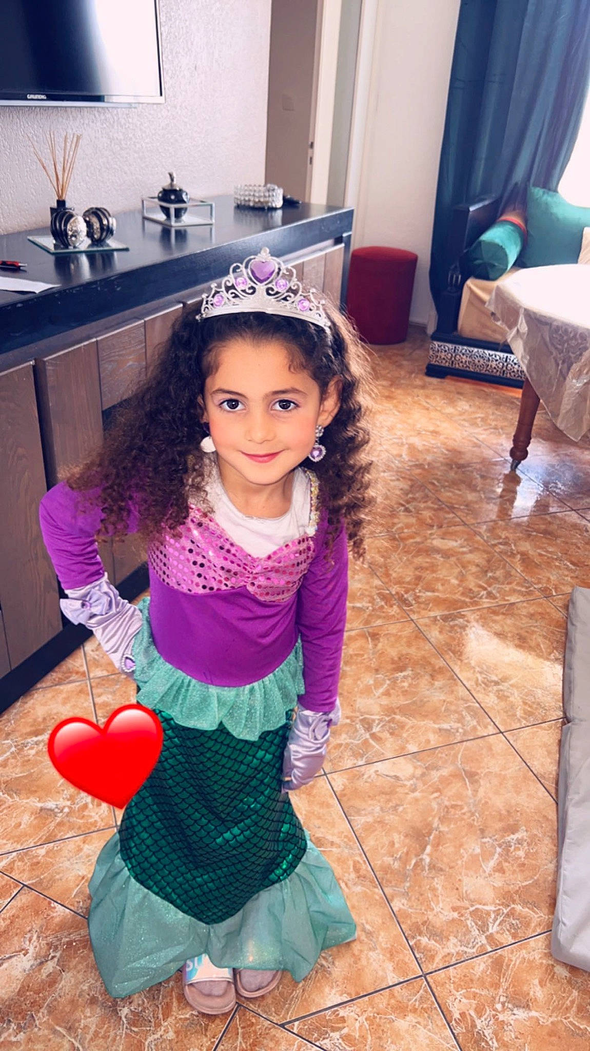 Elissa participe au concours pour gagner de l'argent avec cette photo : black_hair, cabinetry, child, clothing, countertop, drawer, event, facial_expression, flooring, fun, hair, hairstyle, happy, joy, leisure, magenta, person, pink, purple, skin
