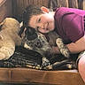 Aggie joined the competition — help win amazing prizes! boy, brindle_dog, child, closeup, cozy, cuddling, dog, friendship, happy, home, indoor, lying_down, pet, portrait, purple_shirt, short_hair, sitting, smiling, stuffed_animal, wooden_background