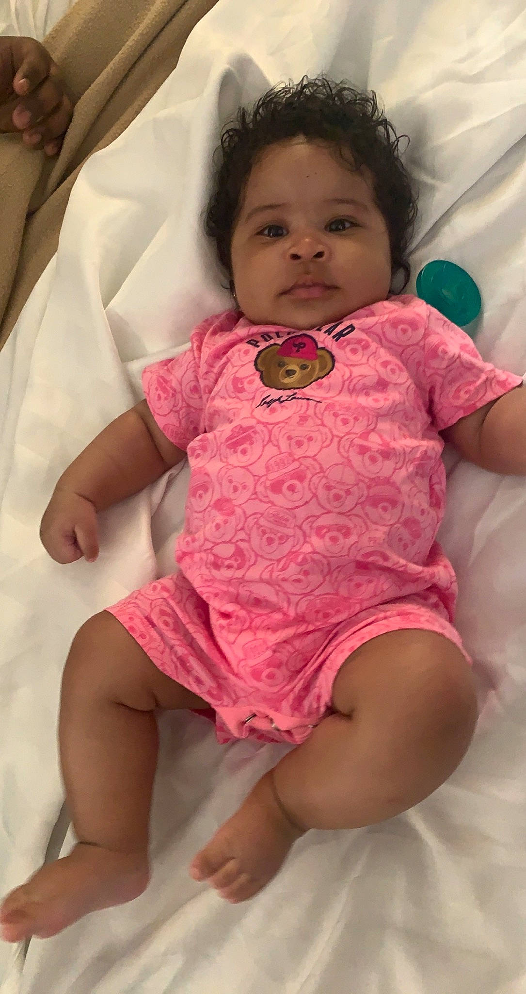 Fortune is registered to the contest to win money with this photo: baby_toddler_clothing, cheek, chin, comfort, eye, face, facial_expression, hand, happy, head, human_body, lip, mouth, neck, nose, person, skin, sleeve, smile, textile