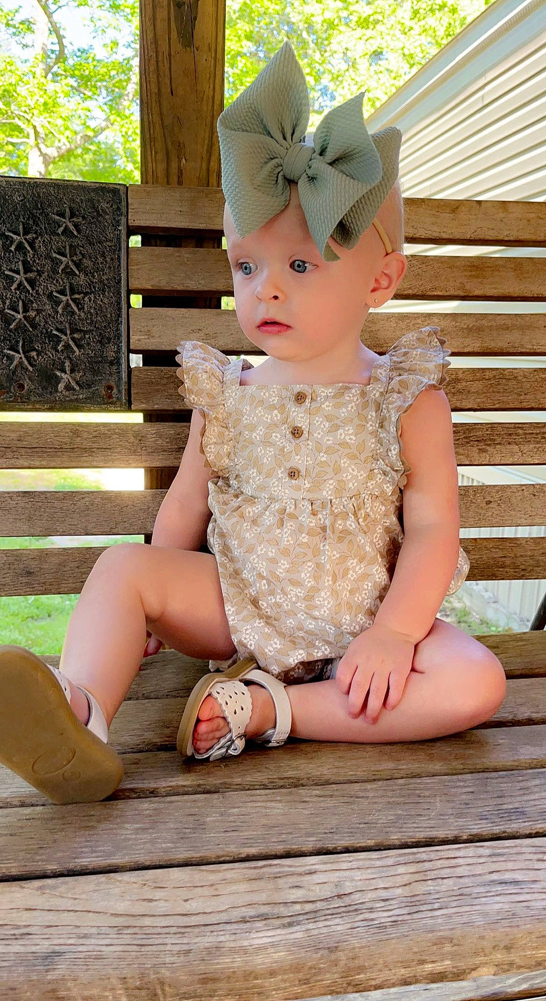 Madalyn is registered to the contest to win money with this photo: baby, baby_toddler_clothing, blond, child, embellishment, eye, flash_photography, grass, happy, headband, headpiece, headwear, human_leg, jewellery, person, pink, sitting, skin, summer, thigh