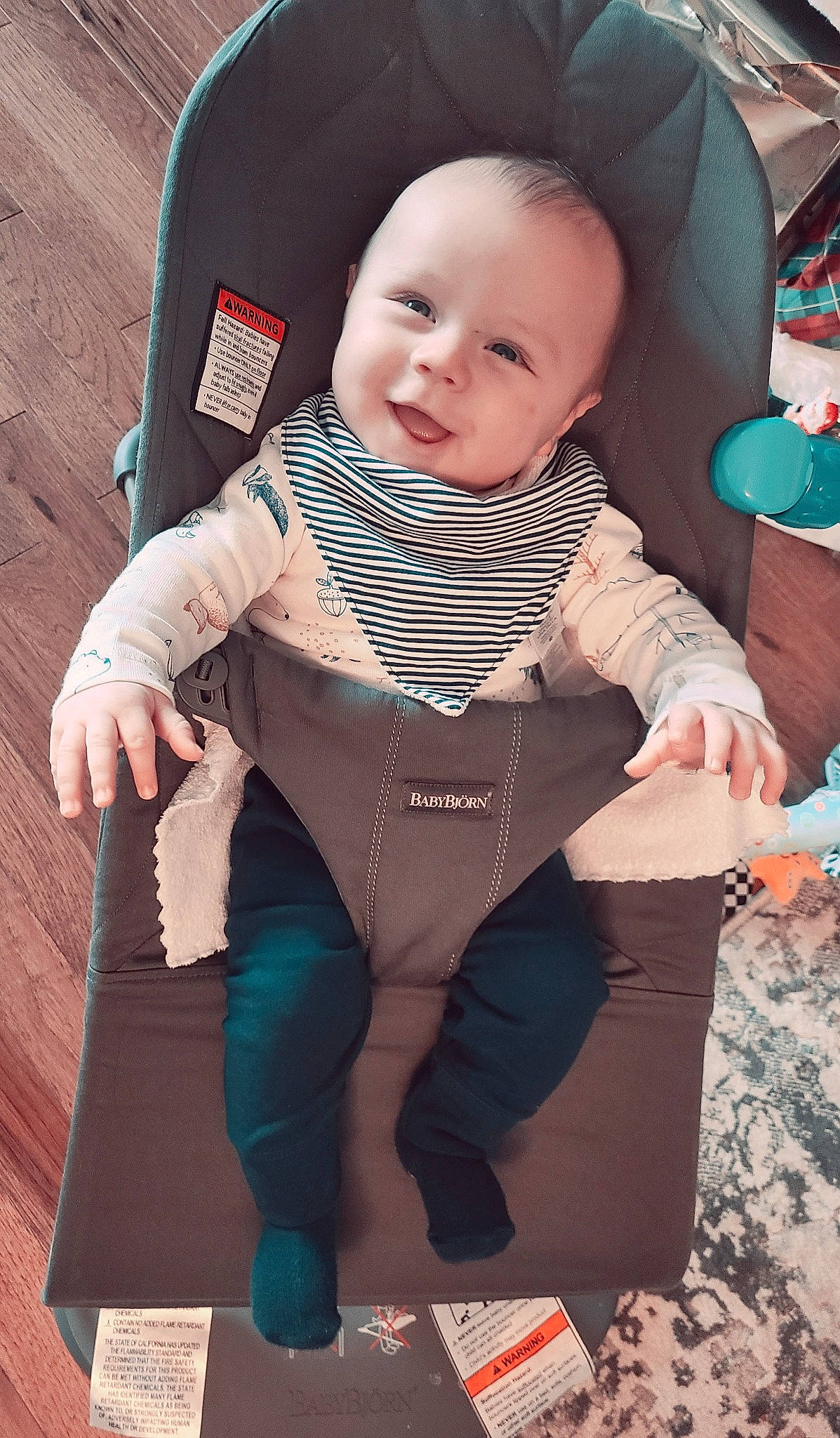 Ashton is registered to the contest to win money with this photo: baby, baby_carriage, baby_products, baby_toddler_clothing, cheek, child, comfort, face, fun, happy, head, human, pattern, person, pink, product, sitting, skin, sleeve, smile