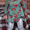 Anastasia is registered to the contest to win money with this photo: child, toddler, girl, dress, reindeer_print, leggings, boots, plaid_blanket, christmas_tree, christmas_presents, holiday, smile, indoor, festive, portrait, cute, blonde_hair, seasonal, decorations, happy