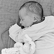 Tobias participe au concours pour gagner de l'argent avec cette photo : baby, newborn, sleeping, plush_toy, bunny, blanket, sweater, infant, child, monochrome, black_and_white, portrait, peaceful, cute, soft_texture, cozy, resting, closeup, young, person