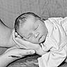 Tobias a rejoint le concours — aidez-le/la à gagner de superbes lots ! newborn, baby, infant, sleeping, hands, adult, black_and_white, portrait, soft, gentle, peaceful, couch, clothing, resting, face, head, close_up, human, skin, tender