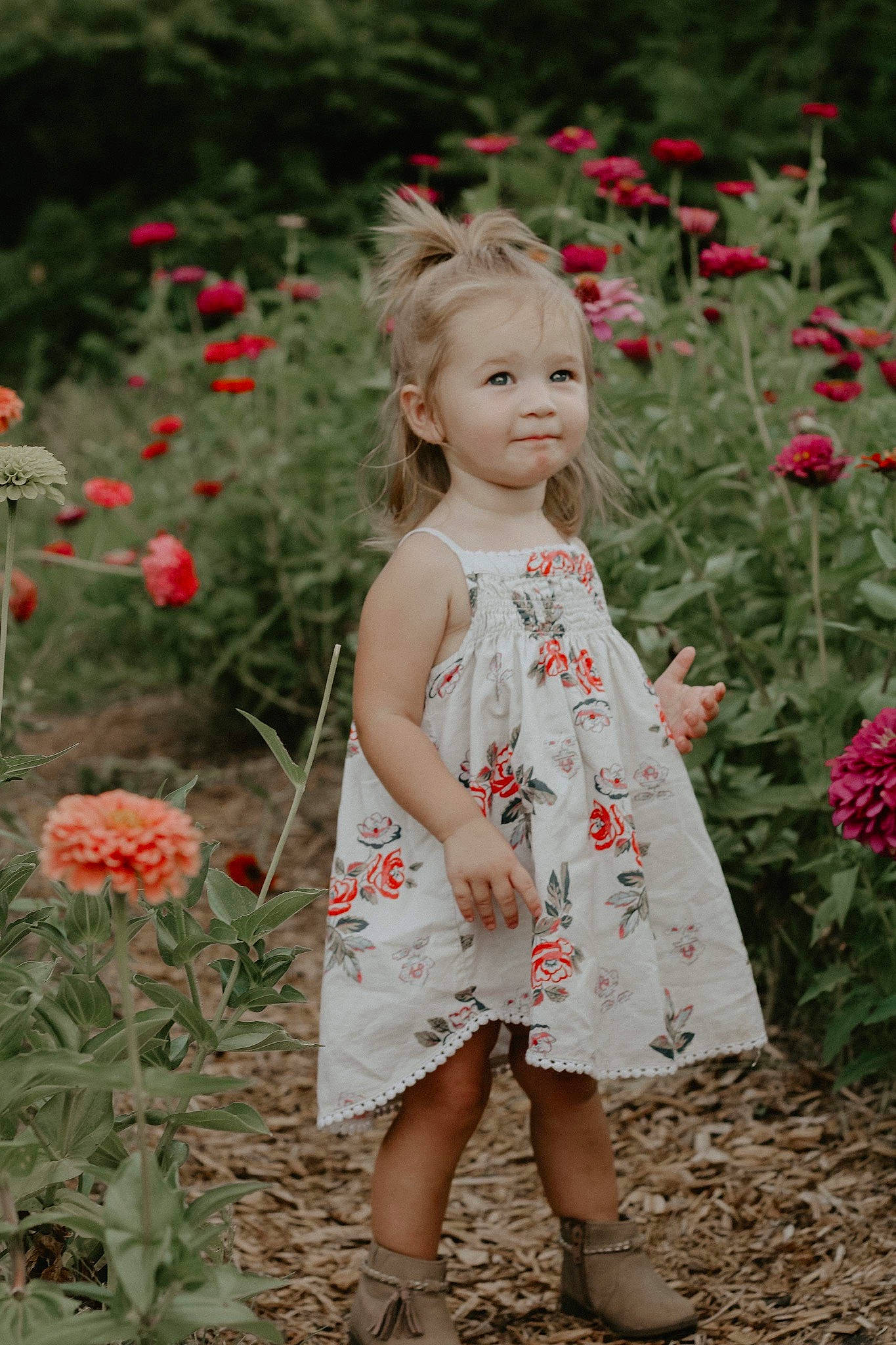 Mason is registered to the contest to win money with this photo: day_dress, dress, face, fawn, flower, flowering_plant, grass, grass_family, happy, leaf, lip, meadow, natural_environment, people_in_nature, person, petal, pink, plant, skin, smile