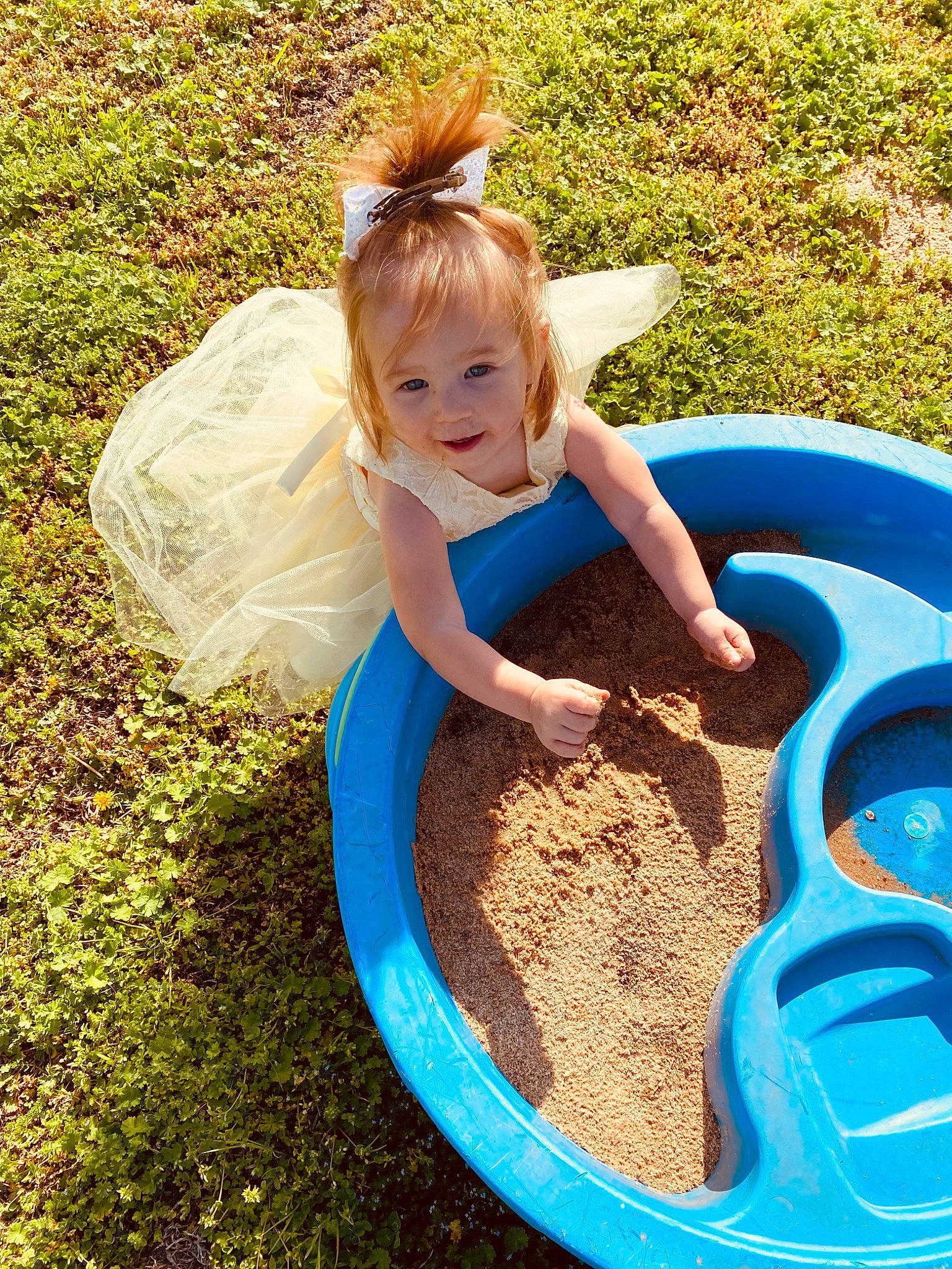 Mason is registered to the contest to win money with this photo: blue, child, electric_blue, fun, garden, gardening, grass, happy, leisure, outdoor_play_equipment, people, people_in_nature, person, play, playground, recreation, smile, soil, summer, t_shirt
