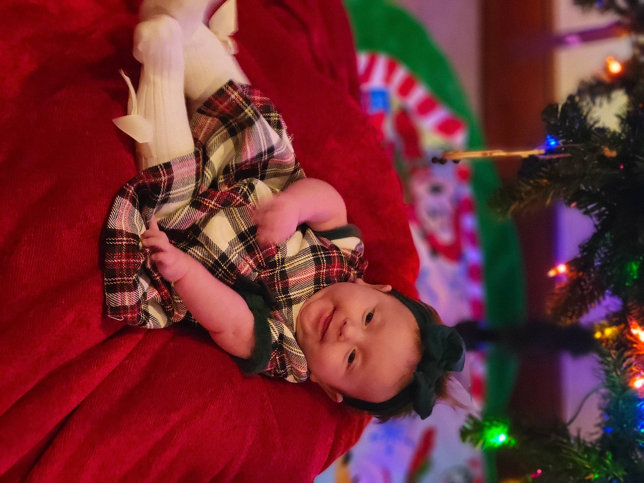 Charleigh joined the competition — help win amazing prizes! brown_hair, child, christmas, christmas_decoration, christmas_eve, christmas_tree, conifer, event, fur, happy, holiday, human_leg, joy, ornament, pattern, person, plaid, plant, tartan, toddler