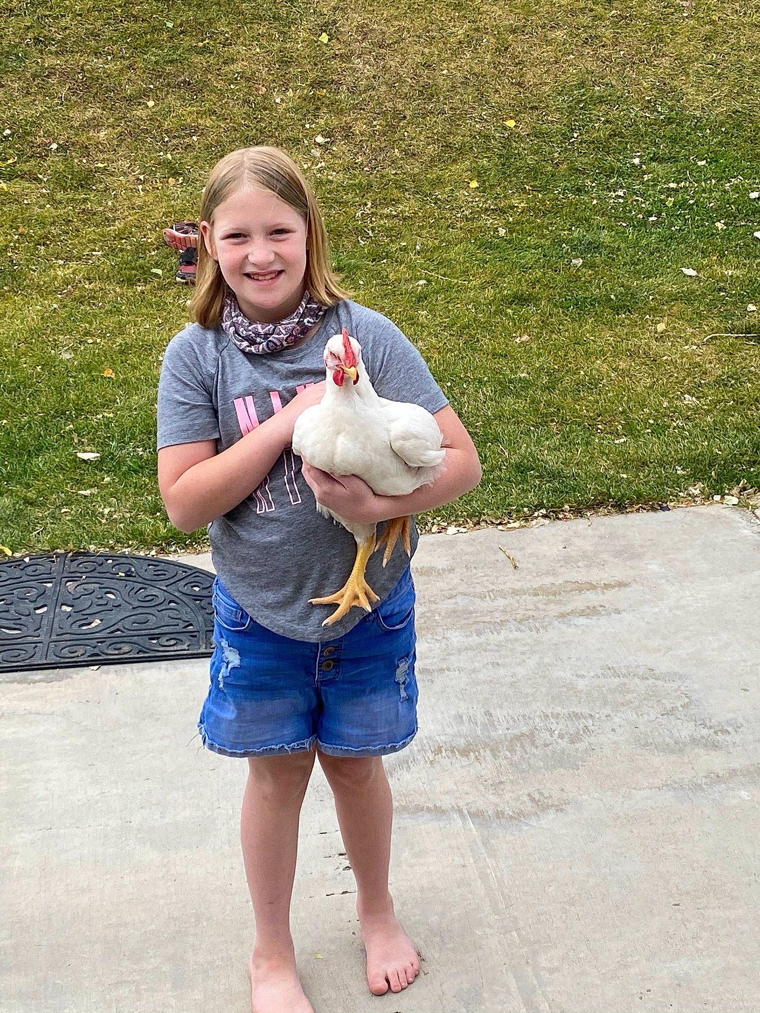 Danilynn joined the competition — help win amazing prizes! arm, barefoot, child, fish, flip_flops, foot, fun, gesture, grass, hand, happy, joint, joy, leisure, people_in_nature, person, recreation, seafood, smile, t_shirt