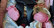 Elliana is registered to the contest to win money with this photo: baby, car_seat, child, comfort, cushion, cute, floral, headband, indoors, infant, mittens, newborn, onesie, peaceful, pink, resting, safety, sleeping, soft, straps