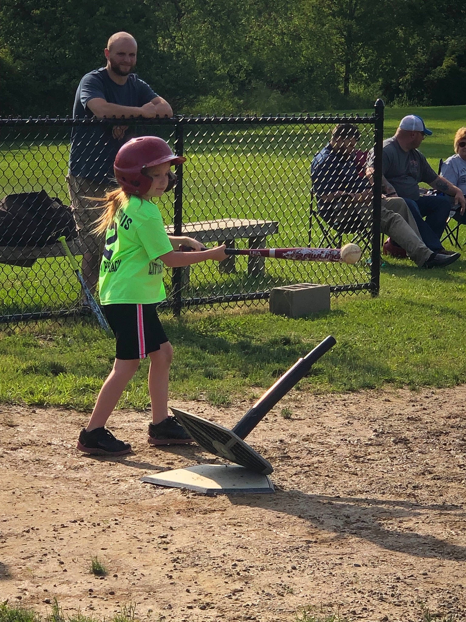 Madison is registered to the contest to win money with this photo: child, competition_event, fun, headwear, leisure, net, outdoor_play_equipment, person, play, playground, public_space, recreation, soil, tree