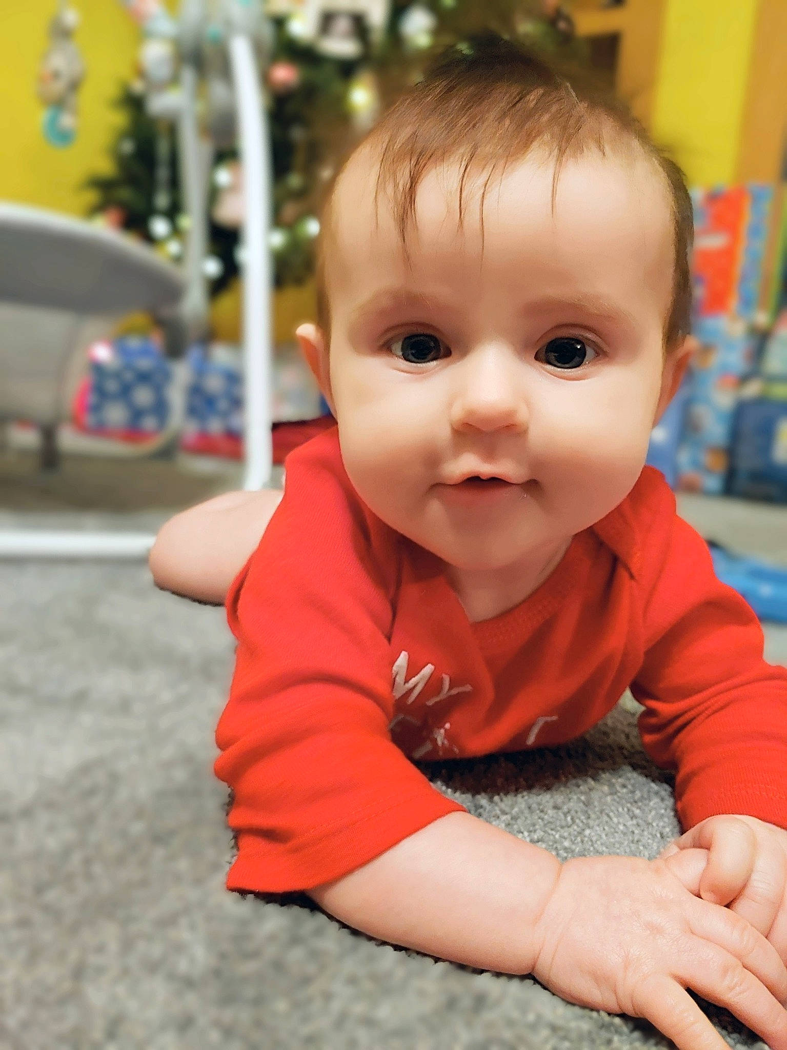 Aryanna is registered to the contest to win money with this photo: baby, baby_crawling, baby_grabbing_for_something, baby_toddler_clothing, cheek, child, crawling, finger, hand, person, skin, toddler, tummy_time
