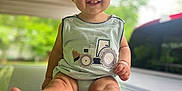 Kashton joined the competition — help win amazing prizes! baby, babylaughing, bodypart, clothing, face, finger, grass, hand, happy, head, outdoors, person, photography, plant, playarea, portrait, shorts, sitting, smile, t_shirt
