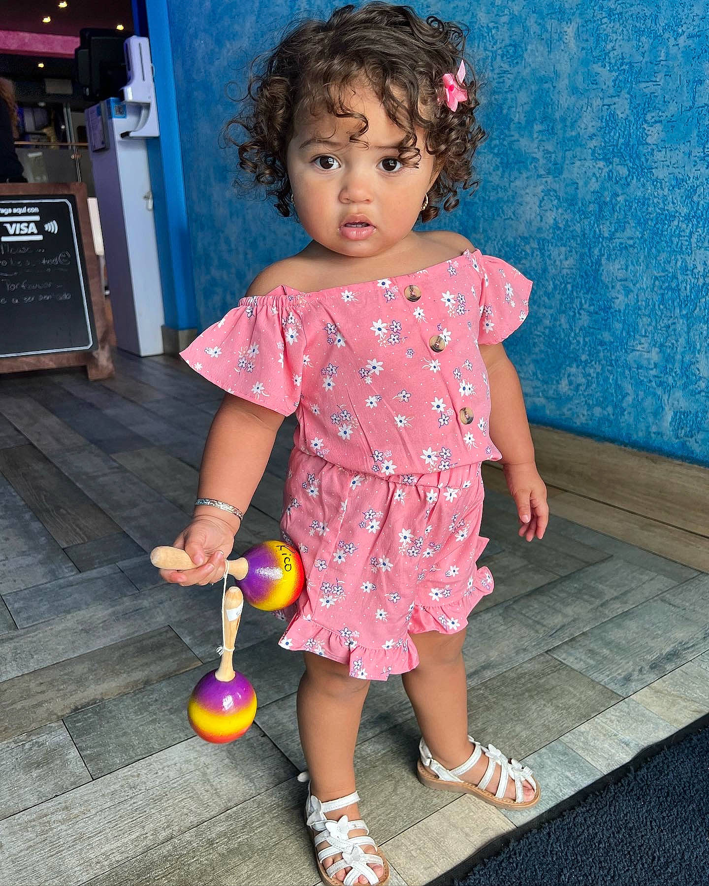 Jeslyn is registered to the contest to win money with this photo: baby_toddler_clothing, blue, dress, facial_expression, footwear, fun, hairstyle, happy, joint, organ, people, person, photograph, pink, purple, red, sandal, shoe, skin, standing