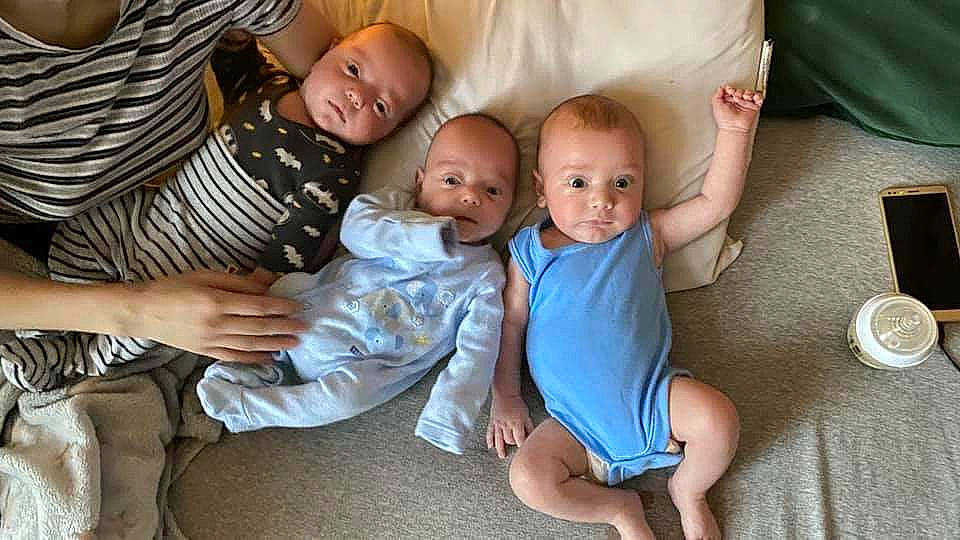 Kevin is registered to the contest to win money with this photo: ankle, arm, baby, baby_toddler_clothing, barefoot, child, comfort, couch, ear, finger, foot, hand, home_accessories, lap, love, mouth, nose, person, pillow, thumb