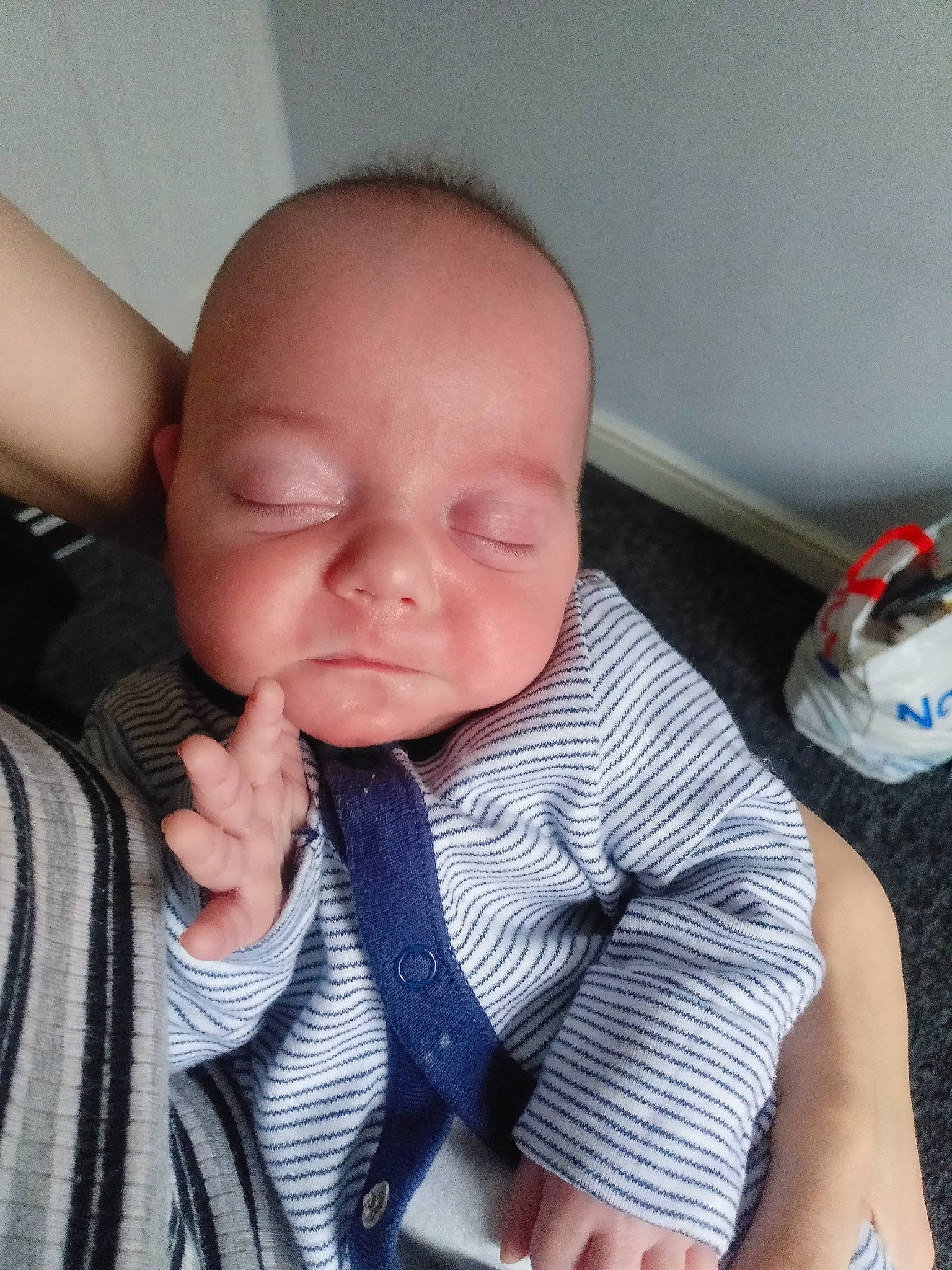 Danny is registered to the contest to win money with this photo: baby, baby_products, baby_sleeping, baby_toddler_clothing, cheek, child, comfort, finger, flesh, nail, nap, person, skin, sleep, thumb, toddler