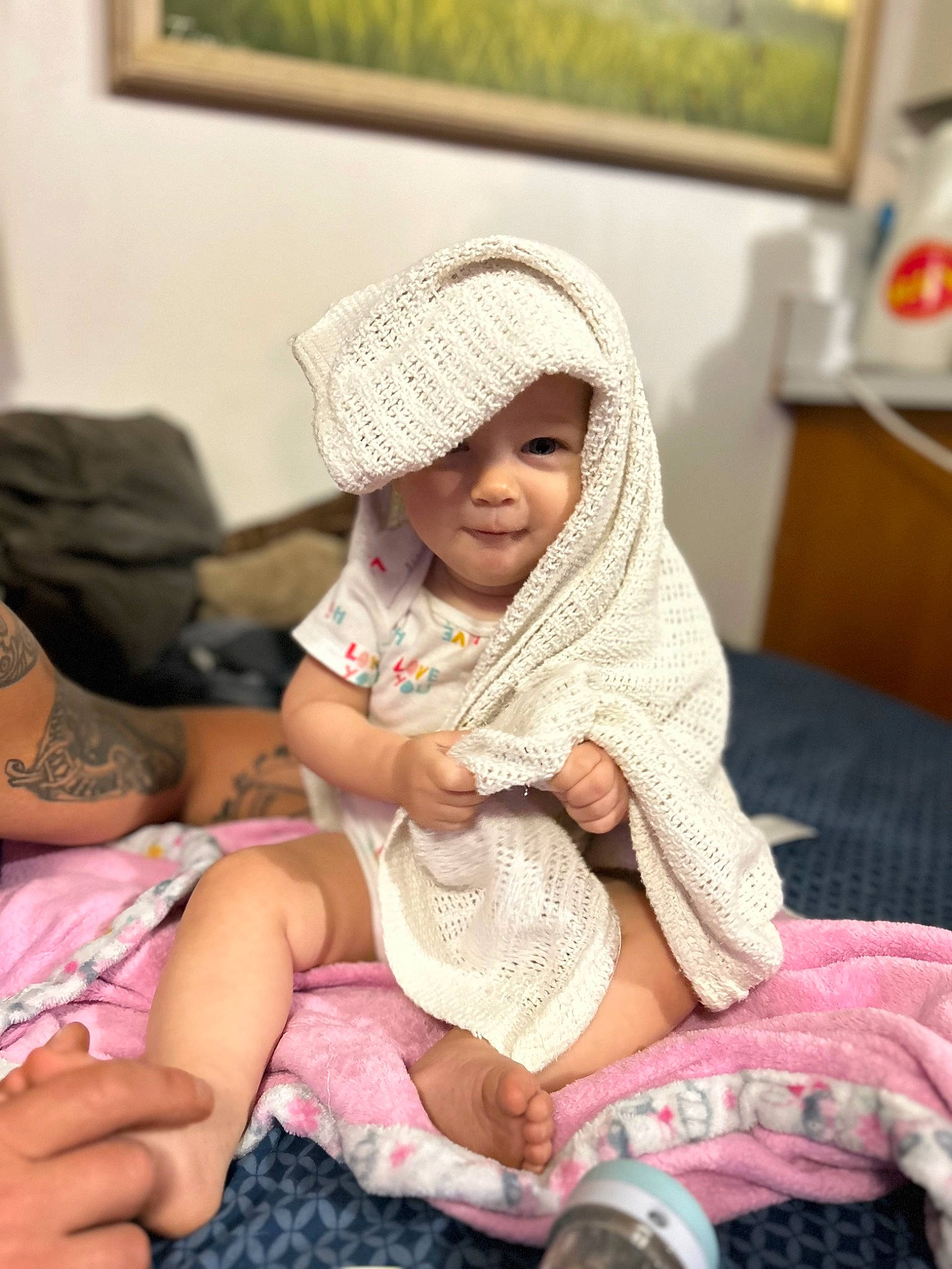 Cynthia joined the competition — help win amazing prizes! child, comfort, fashion_accessory, happy, headwear, human_leg, knee, lap, linens, magenta, pattern, person, picture_frame, pink, room, sitting, skin, smile, textile, thigh