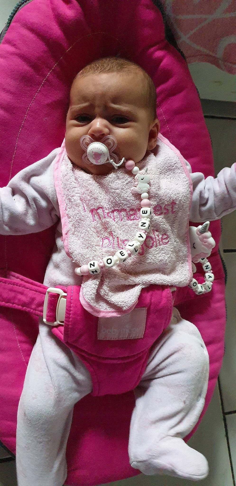 Noëlyne a rejoint le concours — aidez-le/la à gagner de superbes lots ! baby, cheek, child, headwear, magenta, person, pink, toddler