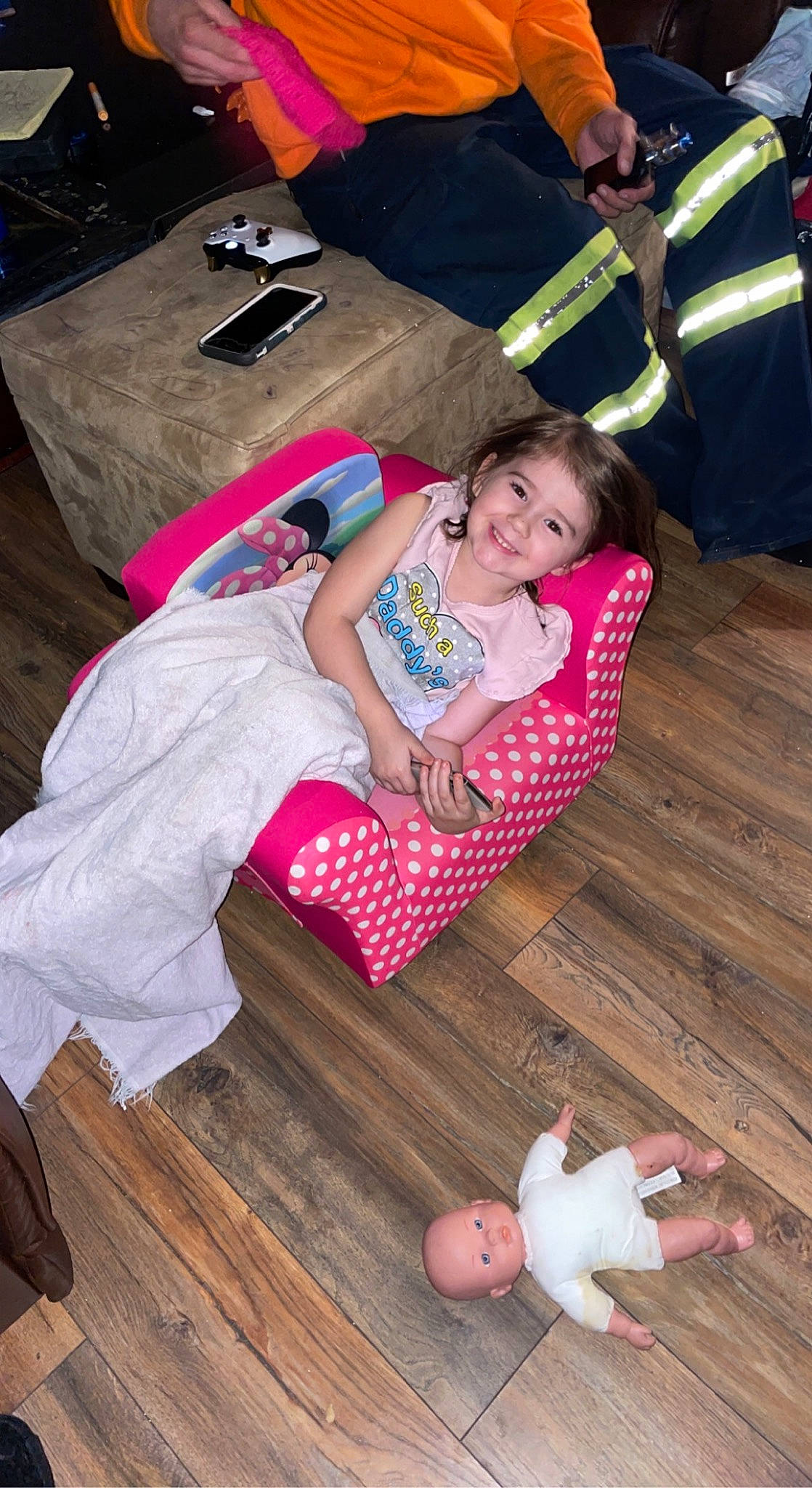 Kleigh joined the competition — help win amazing prizes! child, comfort, floor, flooring, fun, happy, hardwood, joy, lap, leisure, living_room, person, pink, red, skin, smile, snapshot, sock, textile, thigh